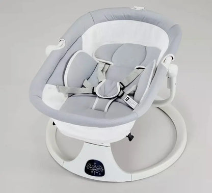 Gray baby swing on a light gray background
