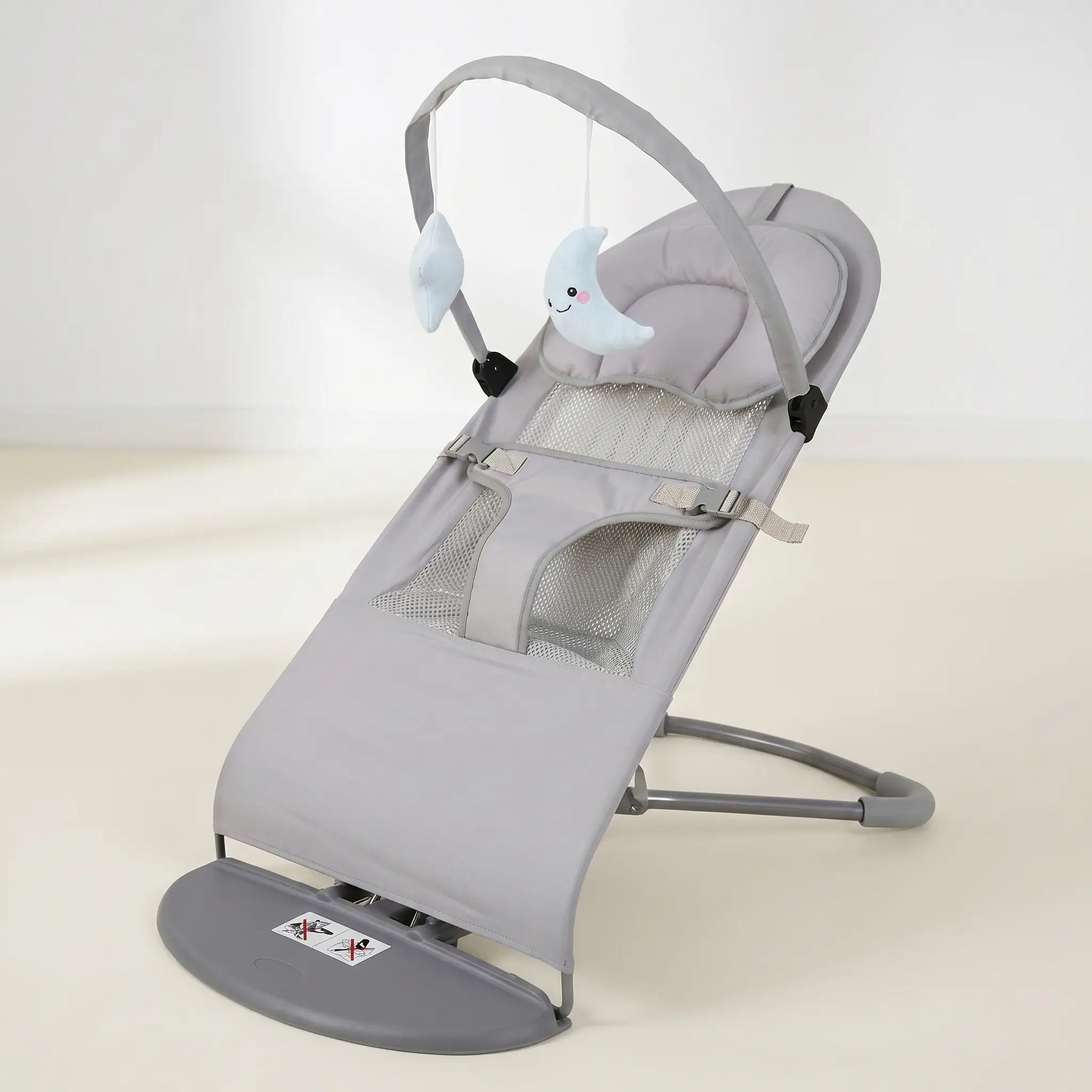 Gray baby swing with a white background