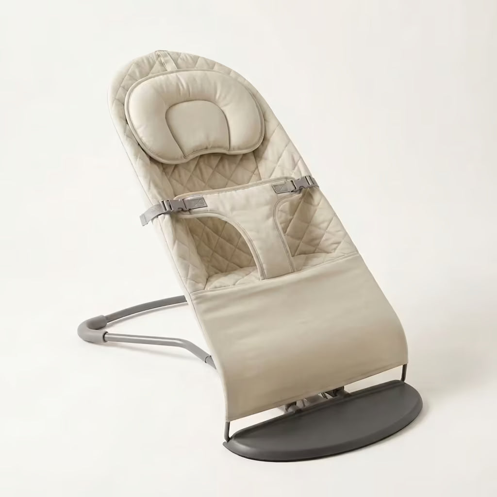 Beige baby bouncer on a white background